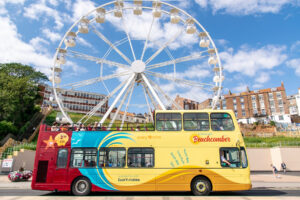 Things for Families in Scarborough Page image 7 Image name Beachcomber Red Seafront Open Top Bus the 5 image from the post Things for Families in Scarborough in Yorkshire.com.