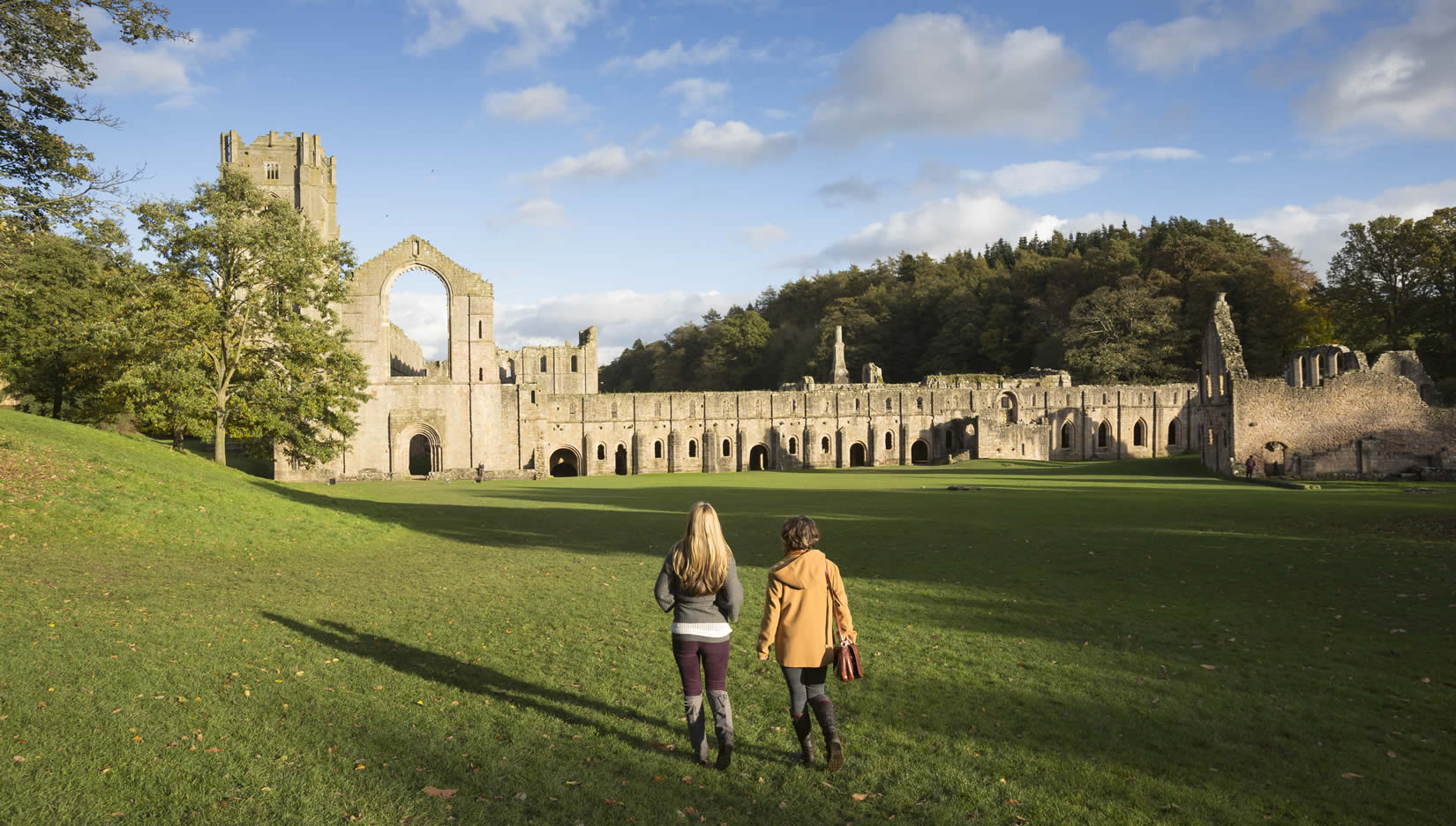 Image name autumn at fountains abbey and studley royal credit national trust fountains abbey and studley royal photographer chris lacey 30 the 10 image from the post Exploring the Enchanting Realms of Fountains Abbey & Studley Royal: A Journey Through Time and Tranquility in Yorkshire.com.