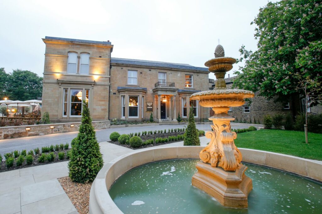 Celebrating Graduation in Yorkshire’s University Cities 2024: A Guide Post image 7 Image name manor house lindley fountain the 5 image from the post Celebrating Graduation in Yorkshire’s University Cities 2024: A Guide in Yorkshire.com.
