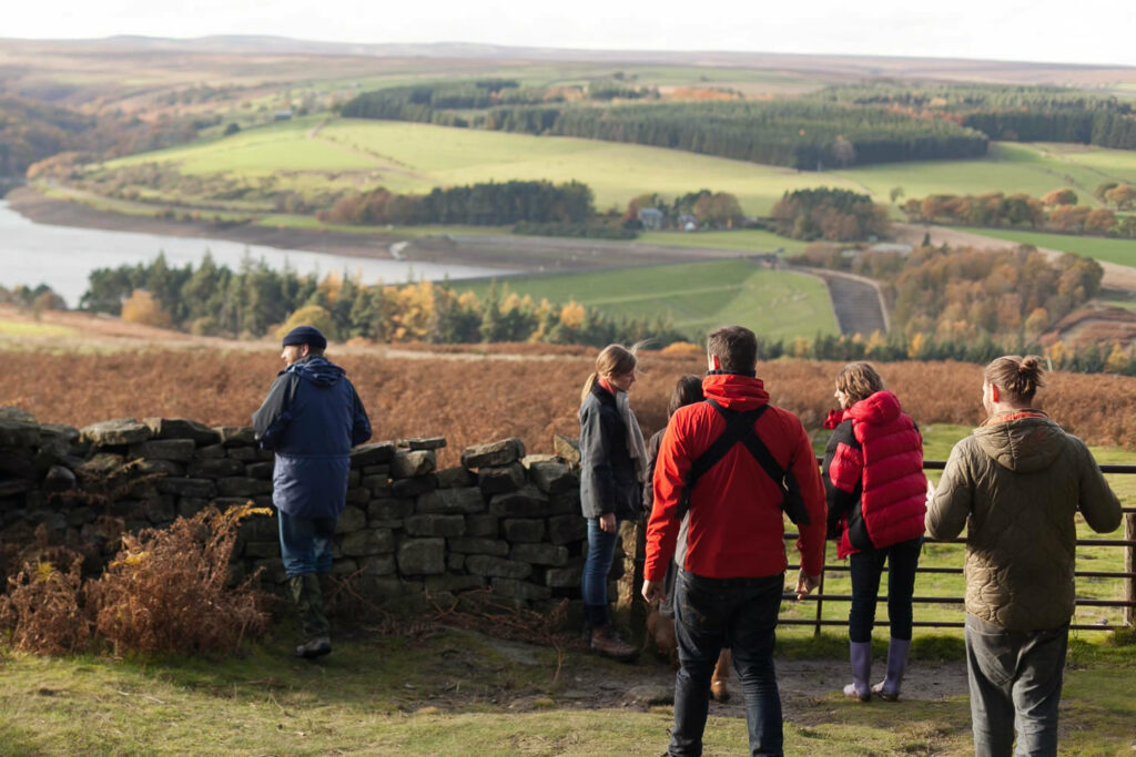 Masham Page image 1 Walkers gather above Leighton Reservoir. near Masham