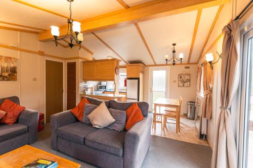 Woodland Lodge With Hot Tub Accommodation image 3 Woodland Lodge With Hot Tub image three