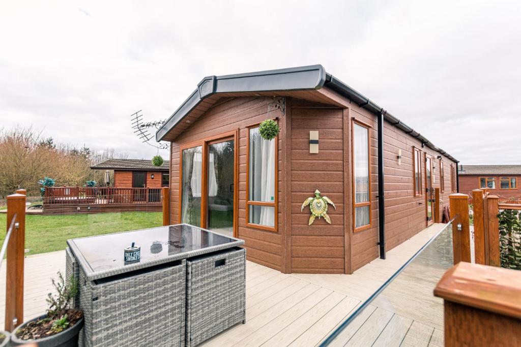 Picture of Meadows Lodge with Hot Tub
