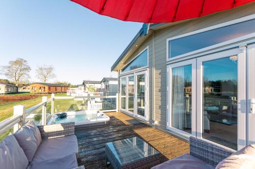 Lakeside Gem with Hot Tub Accommodation image 3 Lakeside Gem with Hot Tub image three