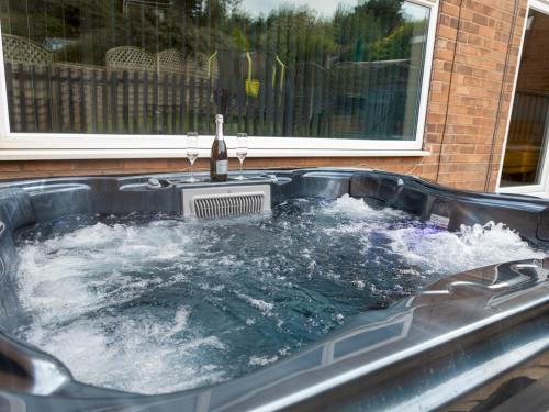 Pass the Keys Amazing 4 bedroom property- Hot tub & Sea Views Accommodation image 3 Pass the Keys Amazing 4 bedroom property- Hot tub & Sea Views image three
