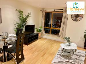 1 Bedroom Apartment by Homevy Relocations Short Lets & Serviced Accommodation Leeds Dock - Stylish and Convenient Accommodation image 2 1 Bedroom Apartment by Homevy Relocations Short Lets & Serviced Accommodation Leeds Dock - Stylish and Convenient image two