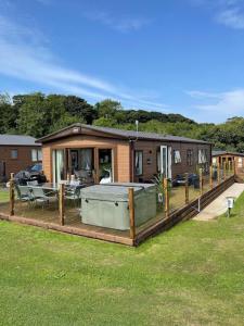 Luxury boutique style lodge with hot tub Accommodation image 1 Luxury boutique style lodge with hot tub image one
