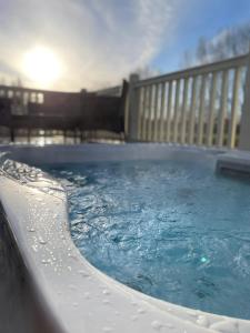 Bakers Lodge with Hot Tub Accommodation image 2 Bakers Lodge with Hot Tub image two
