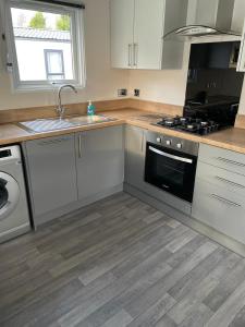 Tarn Lodge with Hot Tub Accommodation image 2 a Self Catering in York