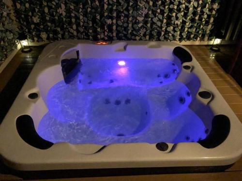 Daisy Lodge with Hot Tub image three