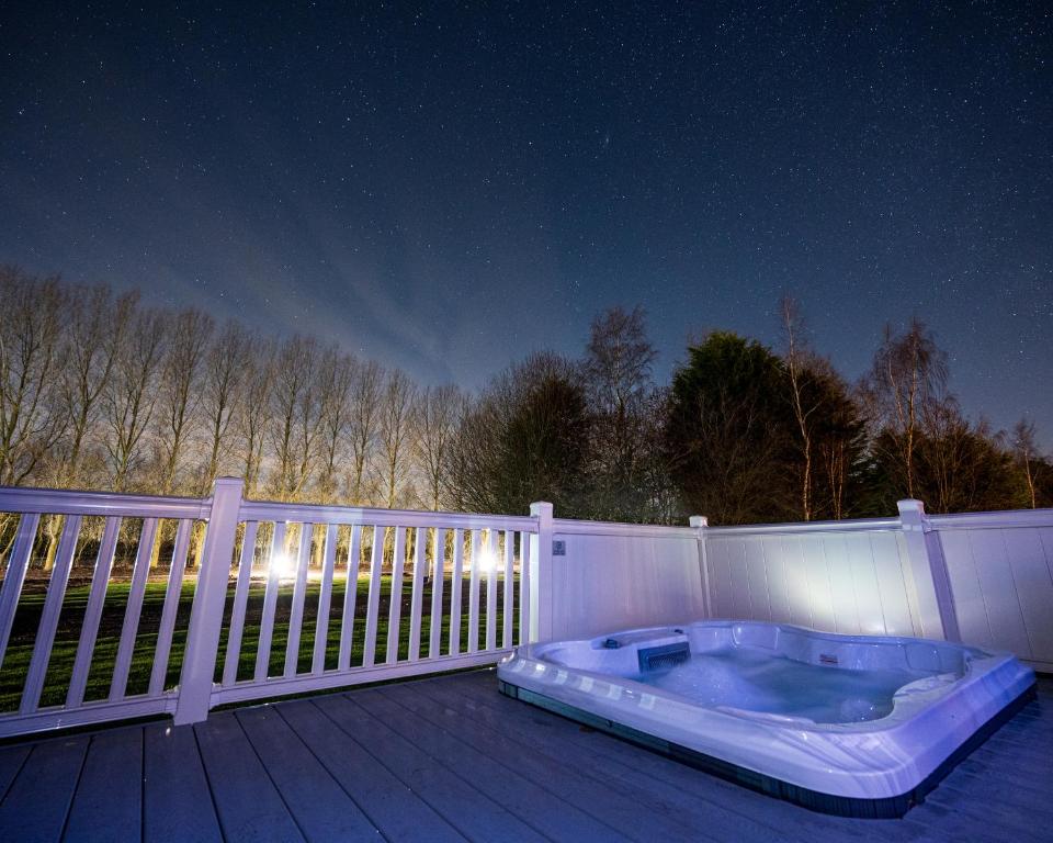 Tarn Lodge with Hot Tub Accommodation image 1 Picture of Tarn Lodge with Hot Tub
