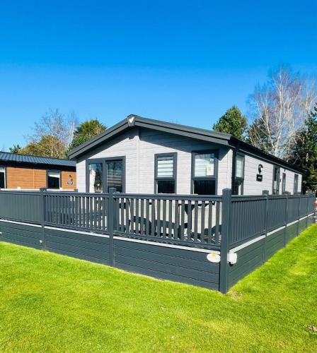 Black Moorhen Lodge with Hot Tub Accommodation image 1 Black Moorhen Lodge with Hot Tub image one