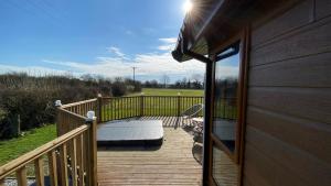Long Meadow Lodge with Hot Tub image two