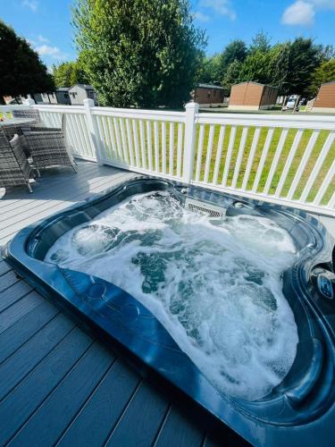 The Braunston Lodge with Hot Tub Accommodation image 3 The Braunston Lodge with Hot Tub image three