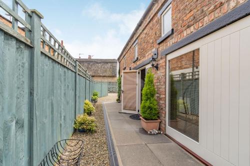 Upstairs Downstairs Cottage image three