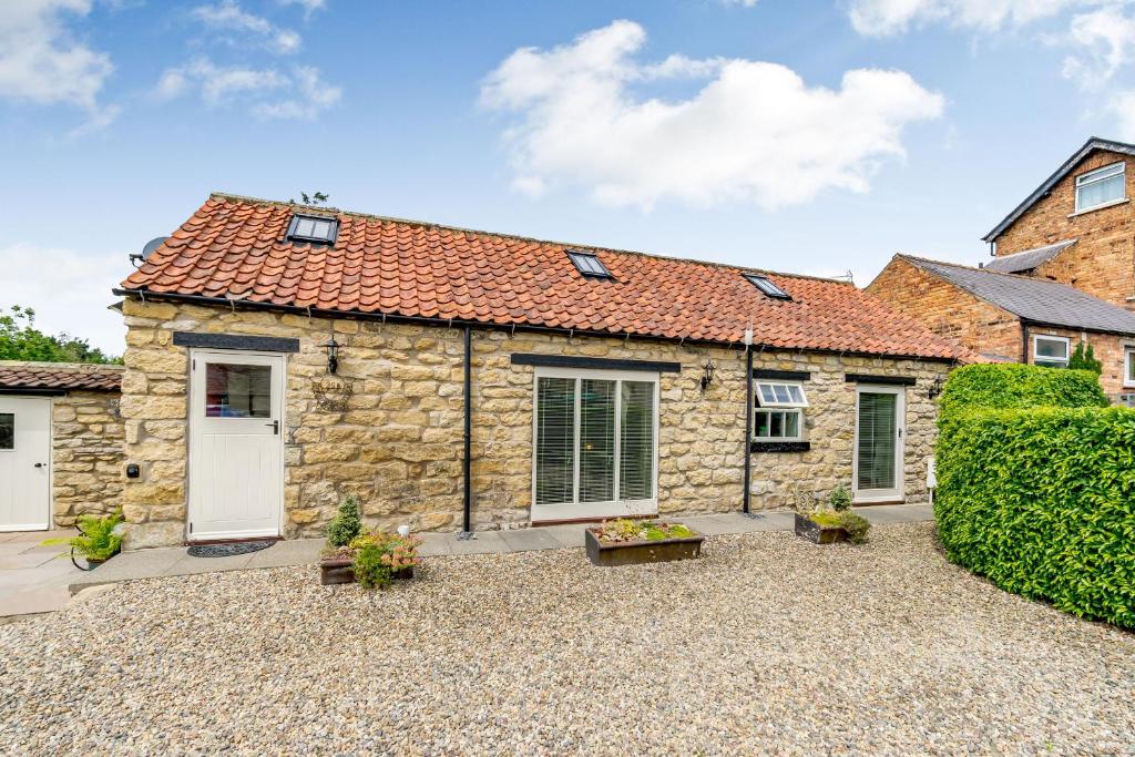 Cow Byre Cottage, Scarborough image one