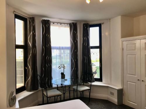 The Carlton's Holiday Suites image three