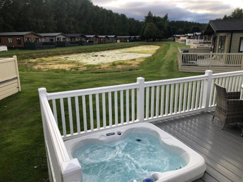 The Poplars Lodge with Hot Tub Accommodation image 3 The Poplars Lodge with Hot Tub image three