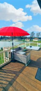 Lakeside Gem with Hot Tub Accommodation image 1 Lakeside Gem with Hot Tub image one