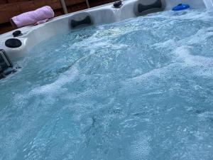 Holly Cabin with Hot Tub image two