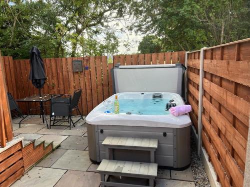Holly Cabin with Hot Tub image three