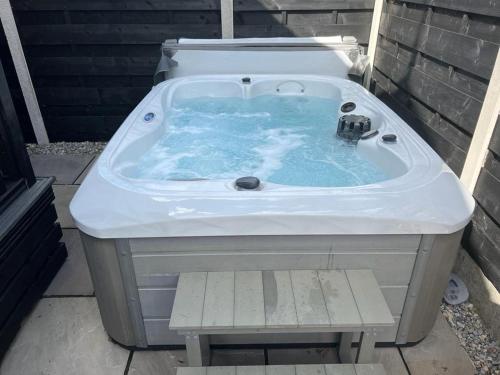 Ivy Cabin with Hot Tub Accommodation image 3 Ivy Cabin with Hot Tub image three