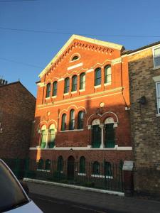 Apartments in Filey - Prices & Bookings Page image 31 Picture of converted chapel filey floor to ceiling arch window