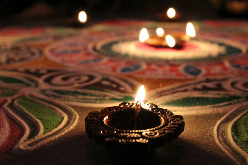 Tell us about your Diwali events Post image 1 diwali oil lamp on patterned floor