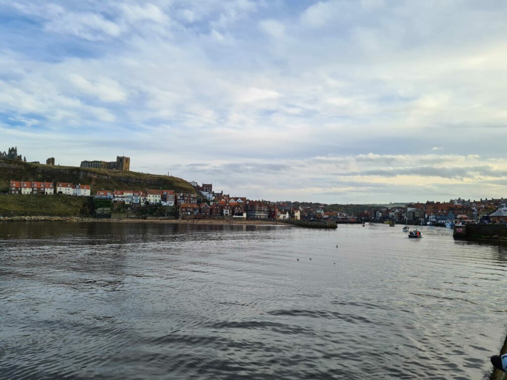Image name whitby harbour looking in from harbour wall copyright yorkshire com international ltd the 10 image from the post Whitby in Yorkshire.com.