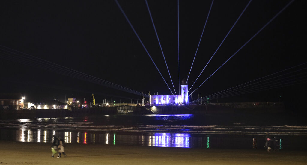 Lighting up the Coast in Yorkshire Post image 2 Image name lighting up the coast yorkshire laser show reflected in beach the 2 image from the post Lighting up the Coast in Yorkshire in Yorkshire.com.