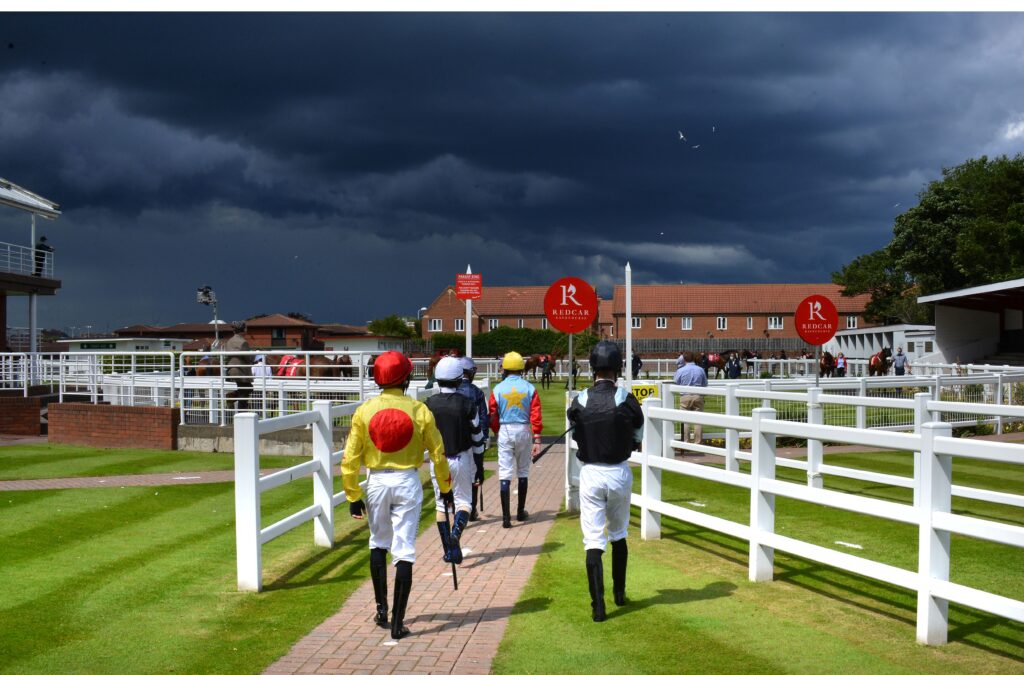 Redcar Racecourse Visitor Attraction image 11 Image name Stormy jockeys the 11 image from the post Redcar Racecourse in Yorkshire.com.
