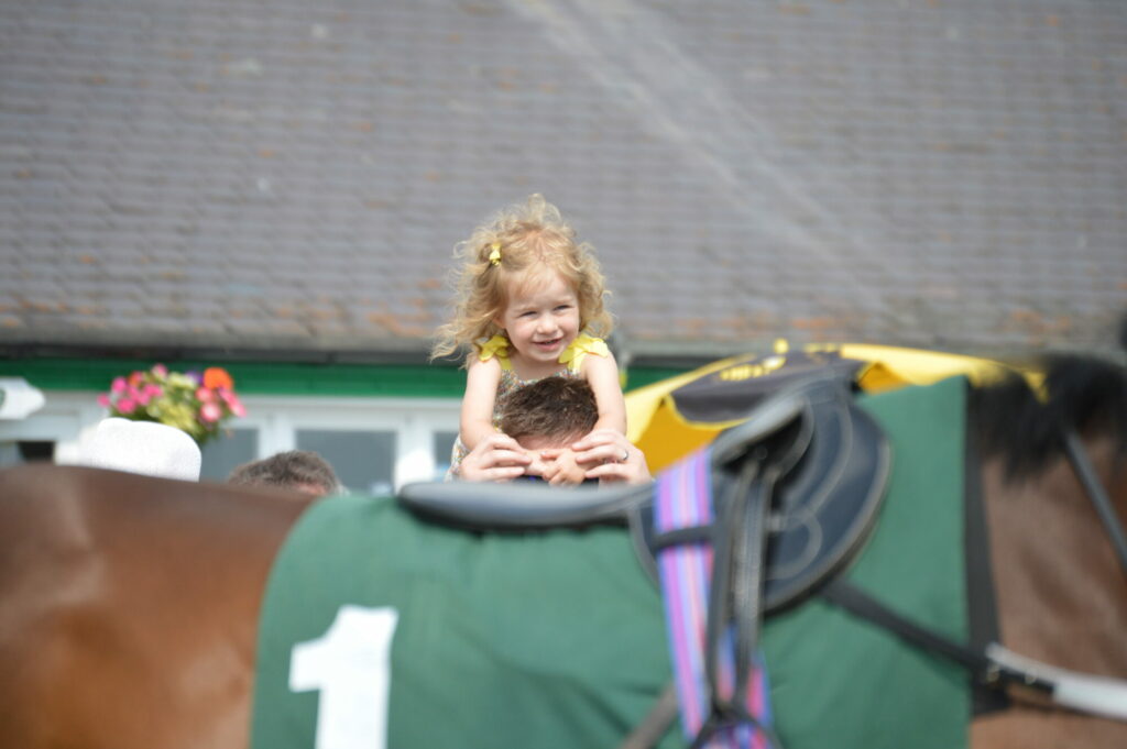 Go Racing In Yorkshire Entity image 5 Image name go racing yorkshire horseracing families watching the 5 image from the post Go Racing In Yorkshire in Yorkshire.com.