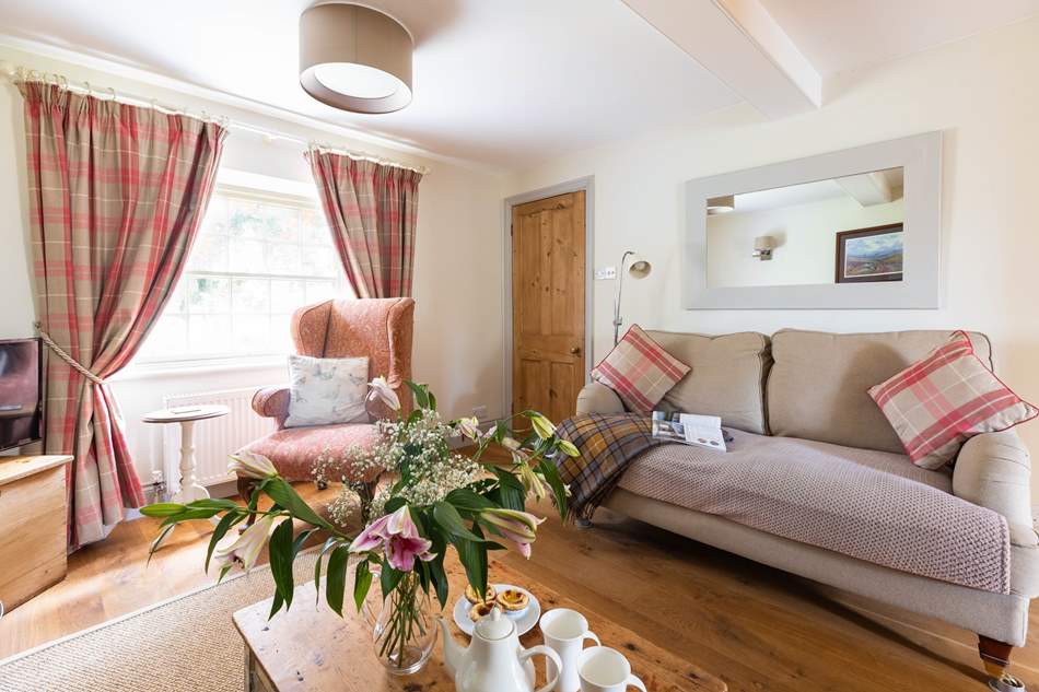 Garden Cottage Accommodation image 4 Image name garden cottage habton classic cottages sitting room sofas the 4 image from the post Garden Cottage in Yorkshire.com.