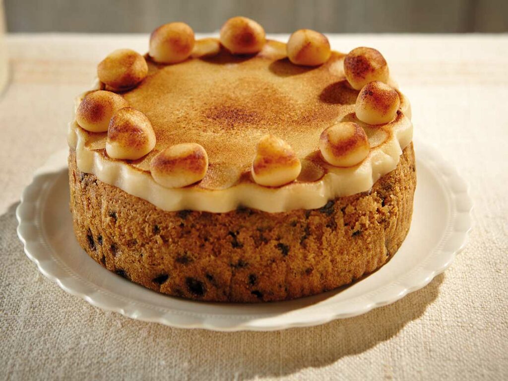 Easter Giveaway: Simnel Cake from Meg Rivers Post image 1 Image name full simnel cake on plate meg rivers the 1 image from the post Easter Giveaway: Simnel Cake from Meg Rivers in Yorkshire.com.