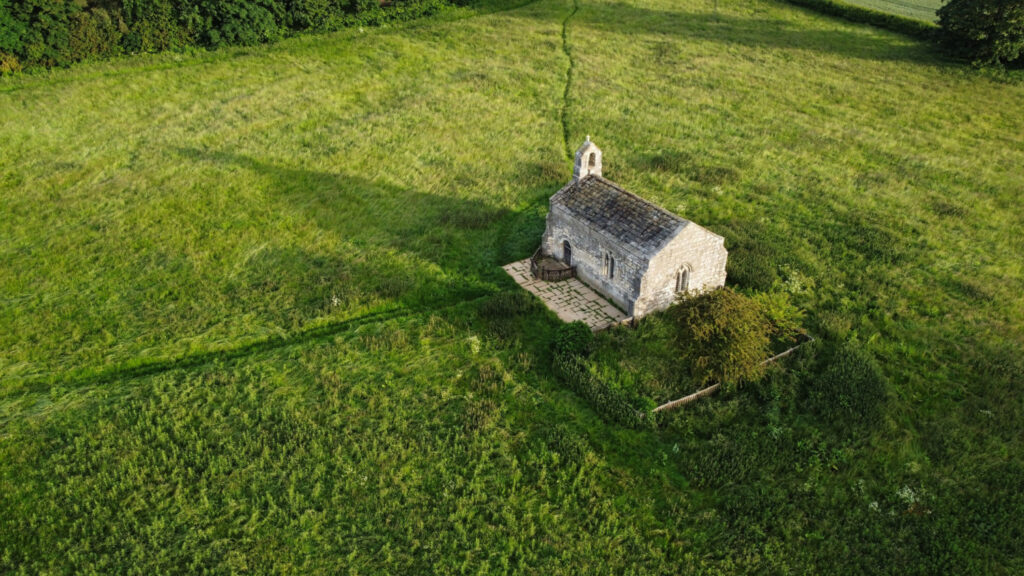 Walk: Towton Battlefield Walk Post image 1 Saxton, North Yorkshire, England, Britain, June 2022, Aerial view of ancient small medieval chapel near Towton battlefield called St. Mary's chapel