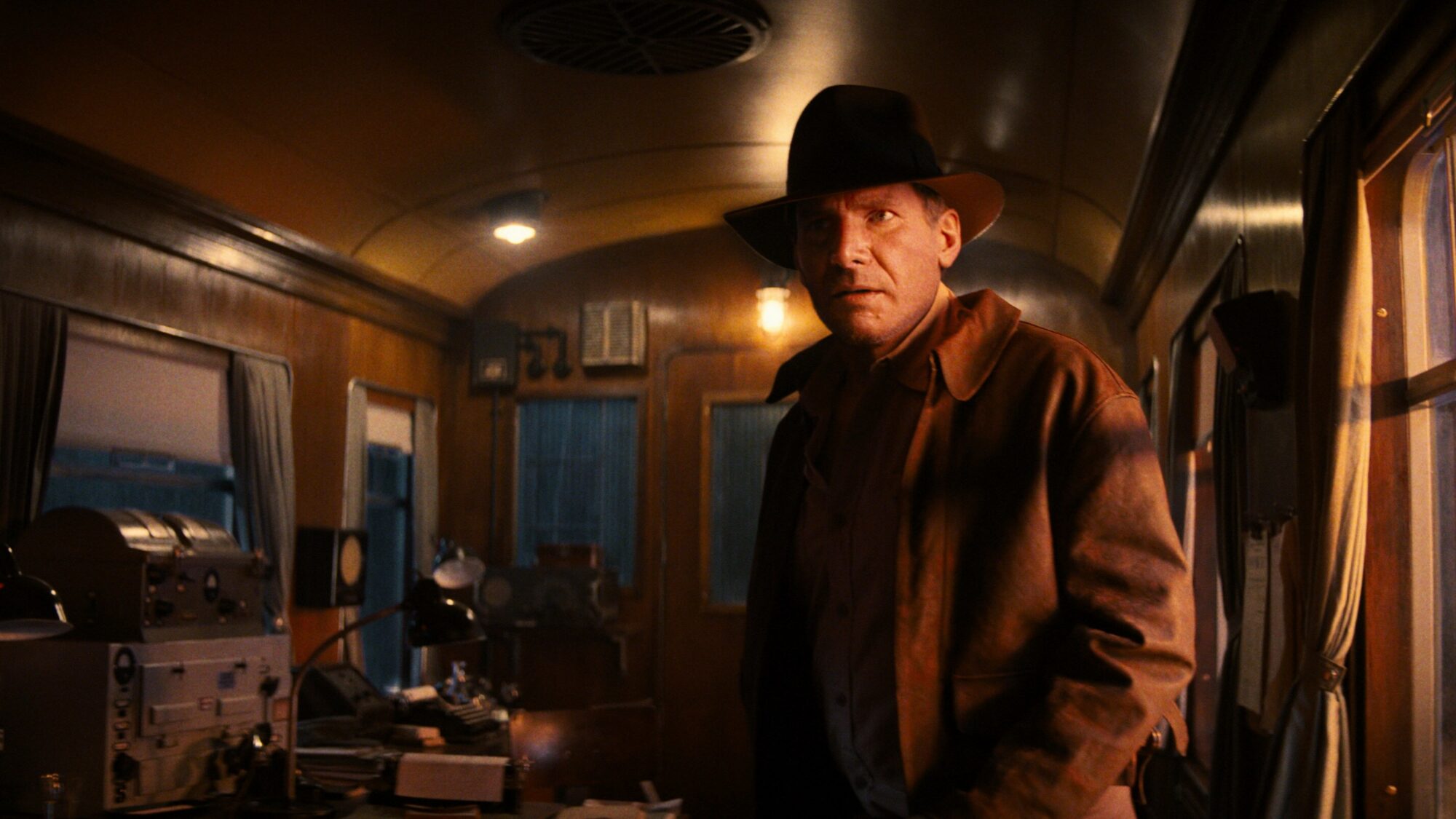 Image name harrison ford indiana jones on train dial of destiny the 9 image from the post Visit the Yorkshire railway used in the new film: Indiana Jones and the Dial of Destiny in Yorkshire.com.
