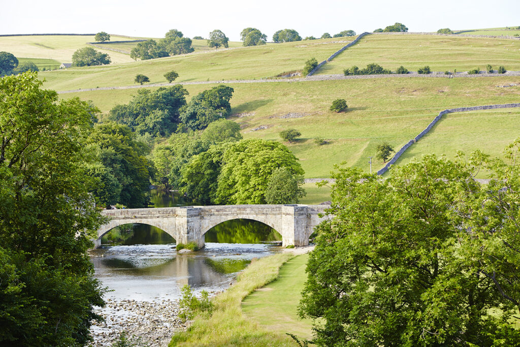 The Devonshire Fell at Burnsall Accommodation image 4 Image name The Devonshire Fell Exterior summer river 8 the 4 image from the post The Devonshire Fell at Burnsall in Yorkshire.com.