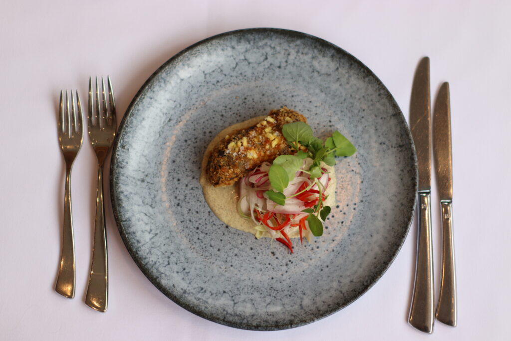 The Fell Restaurant Visitor Attraction image 6 Image name The Devonshire Fell New Chef July 2022 Crispy Ox Cheek Burnt Spring Onion Crema Chilli Radish Salad 1 the 6 image from the post The Fell Restaurant in Yorkshire.com.