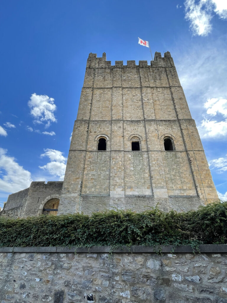 Delving into the history of Richmond Castle Post image 2 Image name richmond castle with flag yorkshire the 2 image from the post Delving into the history of Richmond Castle in Yorkshire.com.