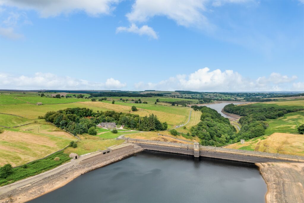 Roundhill Coach House Accommodation image 21 Image name Reservoir with Roundhill 4 xx the 21 image from the post Roundhill Coach House in Yorkshire.com.