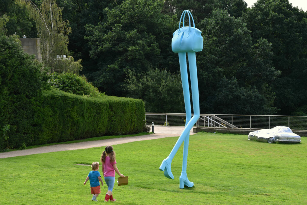 Image name handbag legs blue yorkshire sculpture park mother and baby the 2 image from the post The Top UK Summer Bucket List Experiences: Yorkshire's Sculpture Park and Beyond in Yorkshire.com.