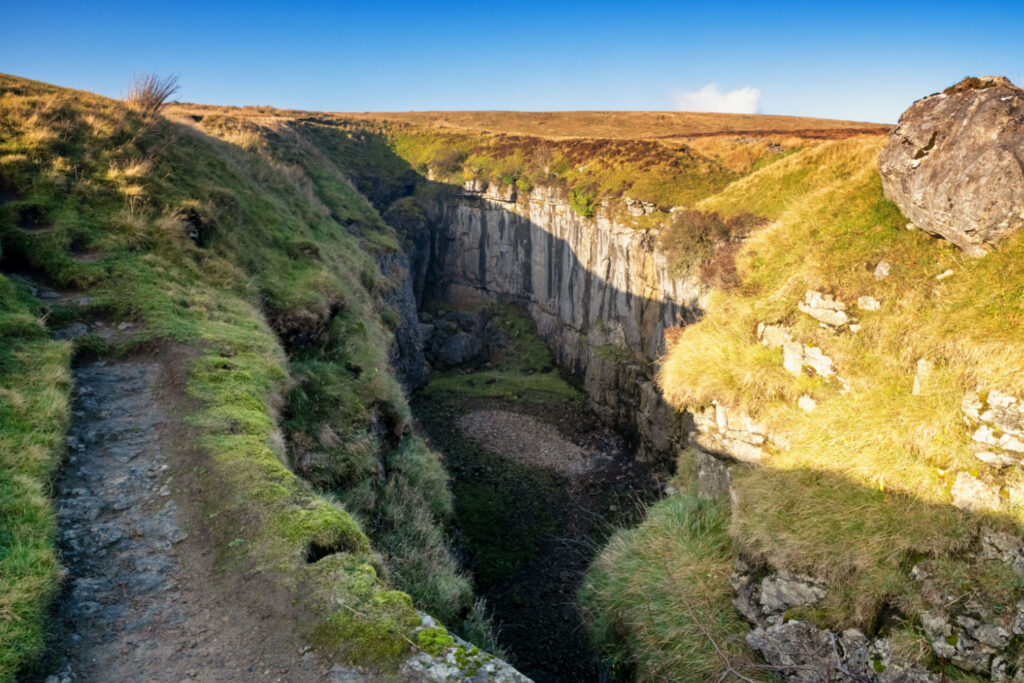 The Enigmatic Caves and Potholes of Yorkshire: A Deep Dive into Nature's Subterranean Marvels Post image 2 Image name hull pot ribblesdale yorkshire the 2 image from the post The Enigmatic Caves and Potholes of Yorkshire: A Deep Dive into Nature's Subterranean Marvels in Yorkshire.com.