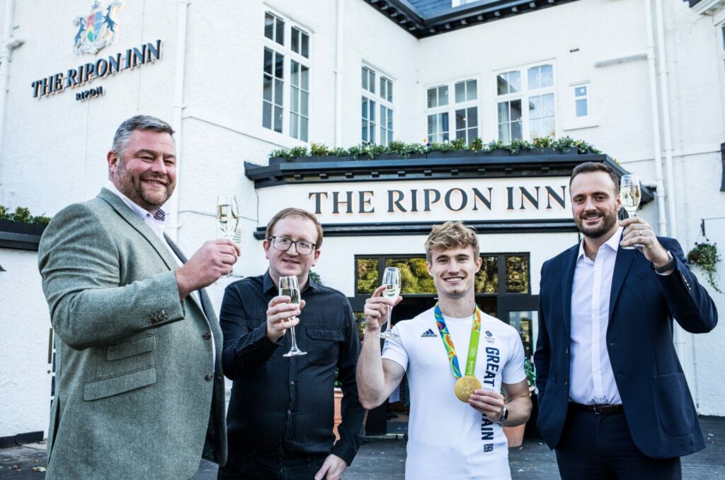 THE INN COLLECTION GROUP PRESS RELEASE - Olympic champion Jack dives "inn" to mark Ripon re-opening Press Release image 5 Image name The Ripon Inn. Reopening toast the 5 image from the post THE INN COLLECTION GROUP PRESS RELEASE - Olympic champion Jack dives "inn" to mark Ripon re-opening in Yorkshire.com.