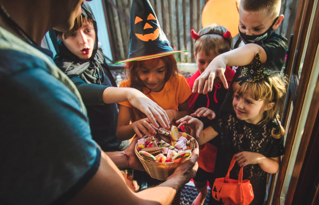 The Haunting Tale of Bradford's Halloween Poisonings: A Lesson from History Post image 4 Image name children taking sweet halloween trick or treat the 4 image from the post The Haunting Tale of Bradford's Halloween Poisonings: A Lesson from History in Yorkshire.com.