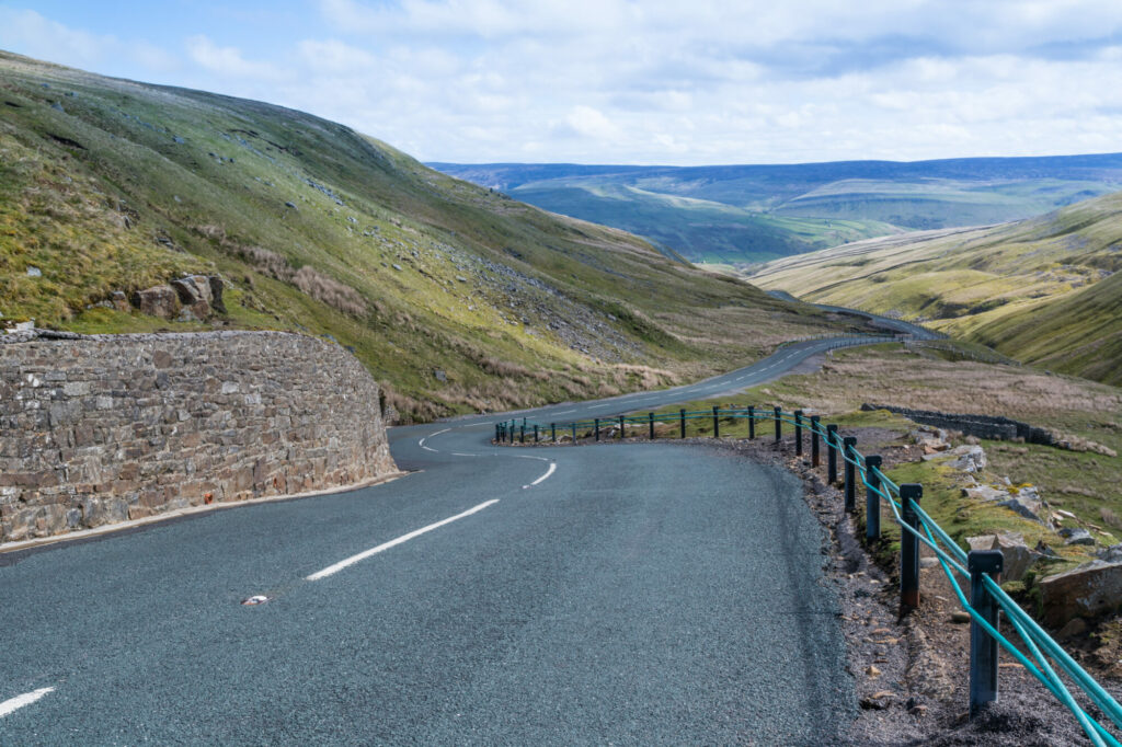 A Journey through the Enchanting Buttertubs Pass: Nature's Own Majestic Highway Post image 1 Image name road buttertubs pass the 1 image from the post A Journey through the Enchanting Buttertubs Pass: Nature's Own Majestic Highway in Yorkshire.com.