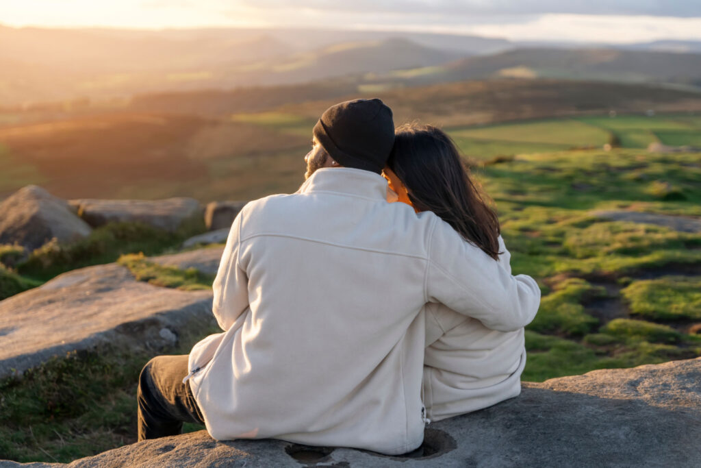 Romantic Valentine's Getaways in Yorkshire: From Magical Proposals to Cosy Stays Post image 1 Image name happy couple countryside view the 1 image from the post Romantic Valentine's Getaways in Yorkshire: From Magical Proposals to Cosy Stays in Yorkshire.com.