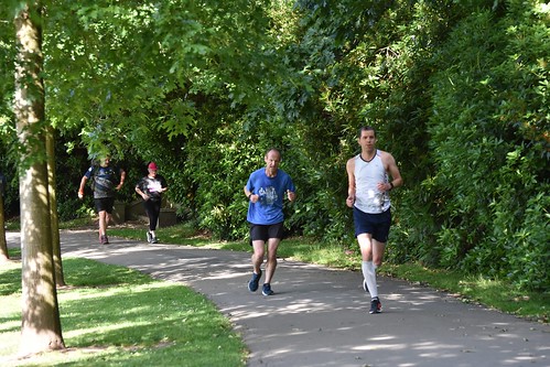 Get Fit & Join The Huddersfield Parkrun Page image 1 runner navigating Greenhead Park for the Huddersfield parkrun