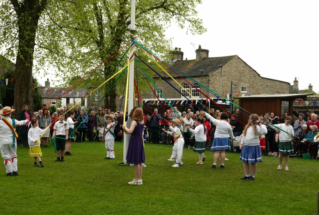 How to Make the Most of the May Bank Holidays in Yorkshire Post image 4 Image name long preston mayday celebrations maypol north yorkshire the 4 image from the post How to Make the Most of the May Bank Holidays in Yorkshire in Yorkshire.com.