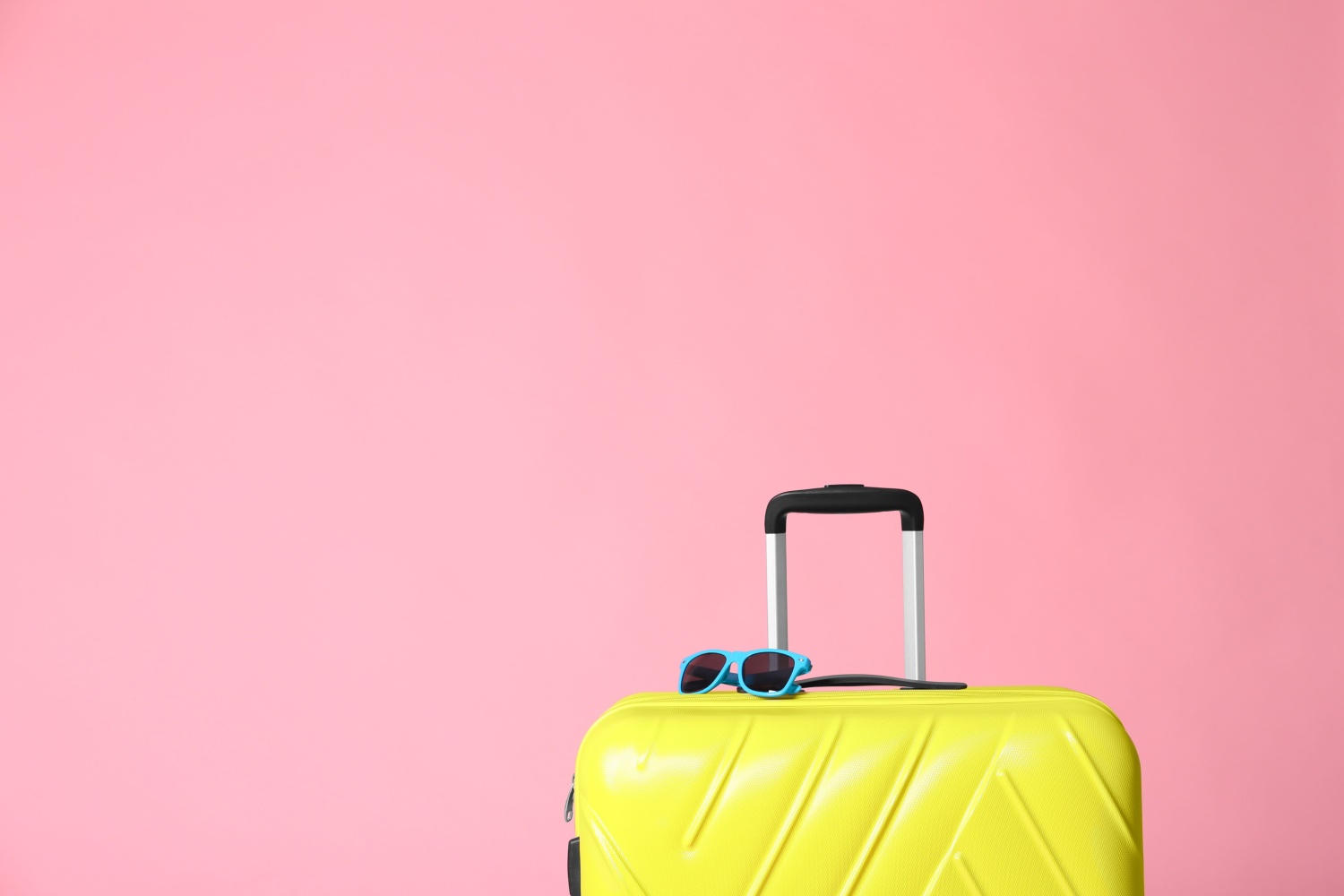 Image name suitcase sunglasses the 2 image from the post VisitBritain releases Annual Review visitor economy data in Yorkshire.com.