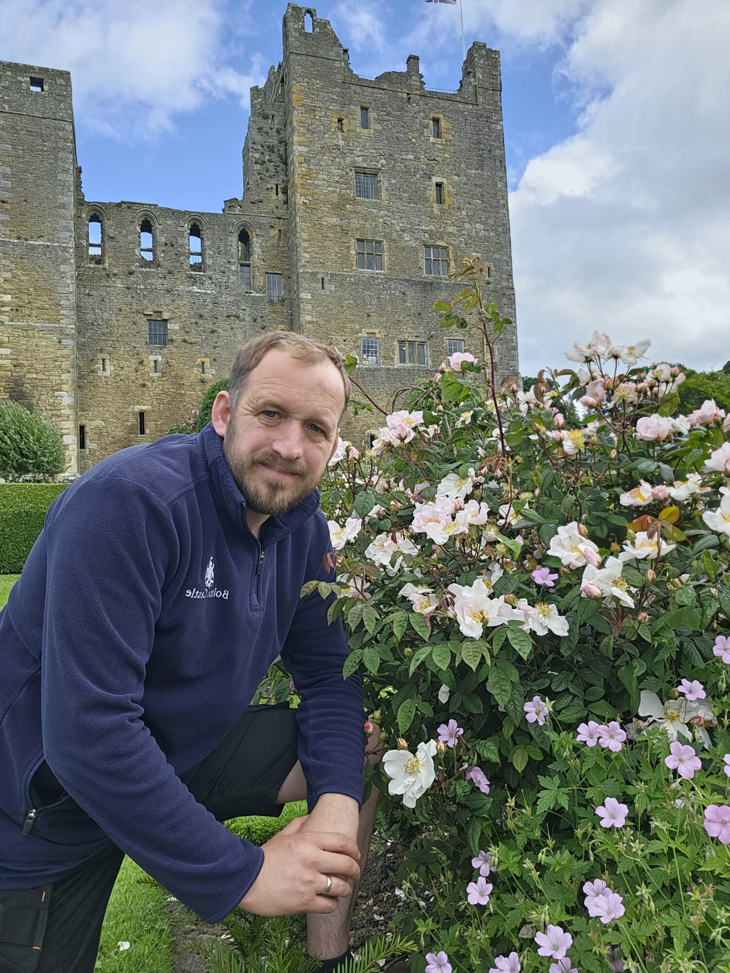 Jason Hanslip with roses at Bolton Castle