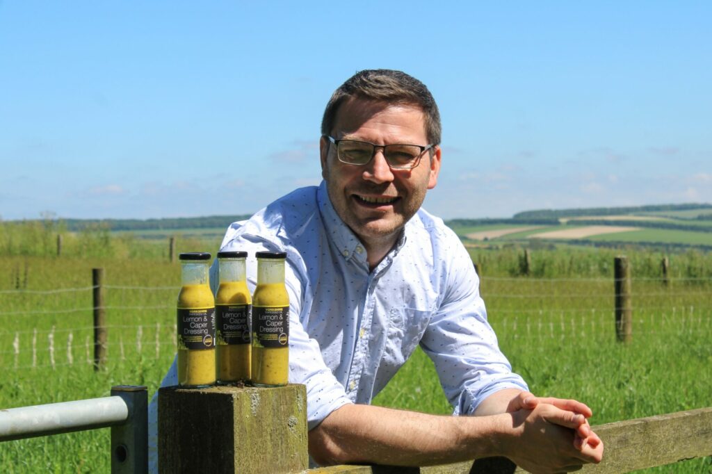 Limited Edition Product for Charity Launched By North Yorkshire Business Post image 1 Image name Jason Thompson with Lemon Caper Dressing the 1 image from the post Limited Edition Product for Charity Launched By North Yorkshire Business in Yorkshire.com.